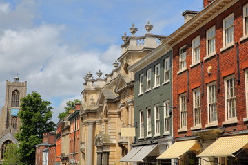 Fototapeta premium Georgian and Victorian houses at St Giles Street in Norwich, Norfolk, UK - The Church of St Giles in the background