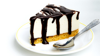 piece of cake bird's milk is on the plate on white background