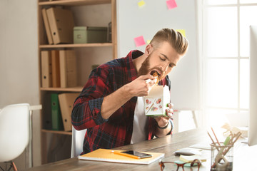 Young man architect working in the office ocuupation