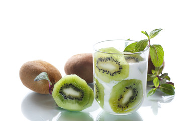 Fototapeta na wymiar Sweet milk organic yogurt with slices of kiwi