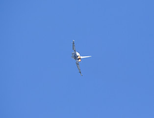 Full speed with afterburner. A modern jet fighter going up