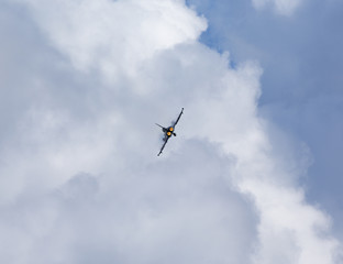 Full speed with afterburner. A modern jet fighter going up