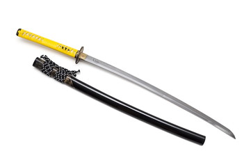 Japanese sword and scabbard on white background wrapped handle by yellow leather  and ray skin on scabbard