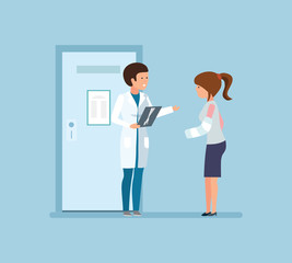 Girl at reception with surgeon's doctor, in premises hospital.