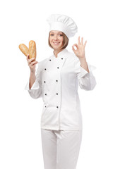 smiling woman professional chef, cook or baker holding fresh bread isolated on white background. restaurant, dieting and cooking food concept. bakery advertisement