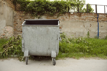 Old Metal Trash Container On Street