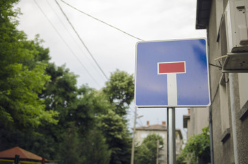 Dead End Street Sign In Town