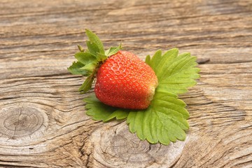 Delicious strawberries on wooden boards