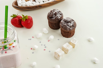 Chocolate cake yogurt with strawberries and pastille