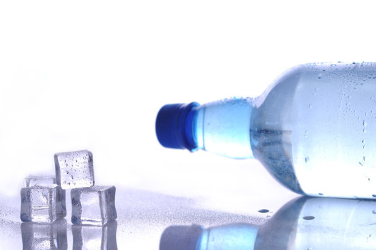 A bottle of water and ice