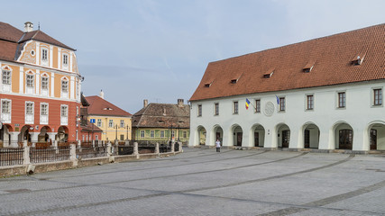 Fototapeta na wymiar The famous Piata Mica, Small Square, historical center of Sibiu, Romania, in a moment of tranquility