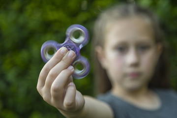 A fidget spinner popular toy for increased focus, stress relief.
