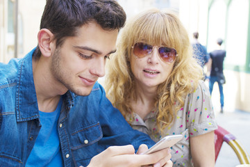 couple drinking coffee with your mobile phone