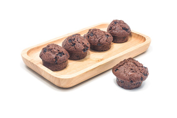 Muffins chocolate on wood with white background.