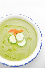 Zucchini soup on white background