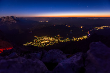 Night view of the city of Mittenwald in Bavaria, Germany seen from the summit of Westliche...