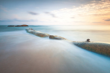 Beautiful long exposure seascape with sunrise or sunset. © Lukasz Sokol