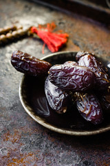 Dates and islamic rosary as ramadan symbol, matif.