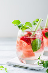 Cold drink with watermelon, strawberry, balm mint