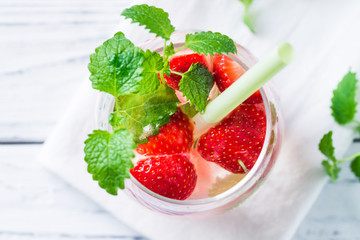 Drink with watermelon, strawberry, balm mint. Top view, close up