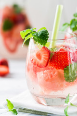 Cold drink with watermelon, strawberry, balm mint