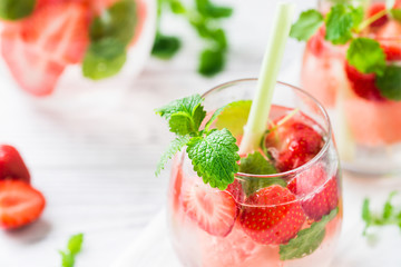 Cold drink with watermelon, strawberry, balm mint. Close up