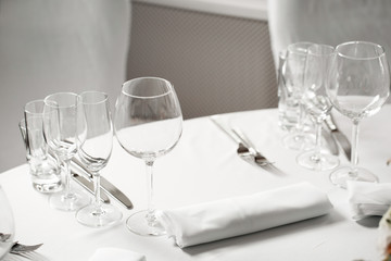 table setting, festive round tables ready for guests.