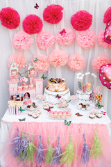 Fototapeta na wymiar colorful birthday party table with cake