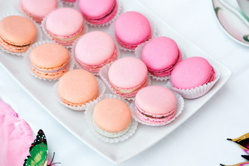 colorful birthday party table with cake. macaroon close-up