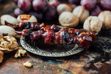 Sweet churchkhela with ingredients.