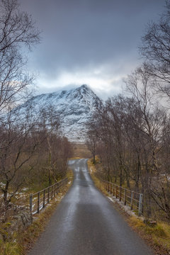 UK, Scotland, Highland, Glen Coe, Glen Etive, Bridge over River Coupall, Sron na Creise Mountain