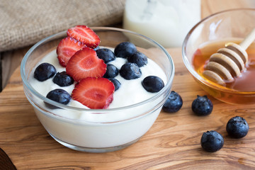Summer breakfast - yogurt with strawberries and blueberries
