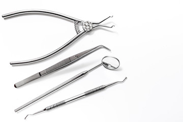 dentist desk with instruments on white background top view mock up