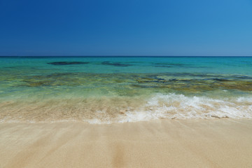 Fototapeta na wymiar Beach with transparent water.