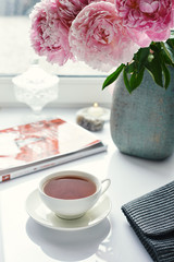 flowers and tea on table