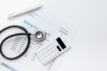 billing statement for for medical service in doctor's office background top view mock up