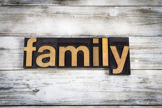 Family Letterpress Word on Wooden Background