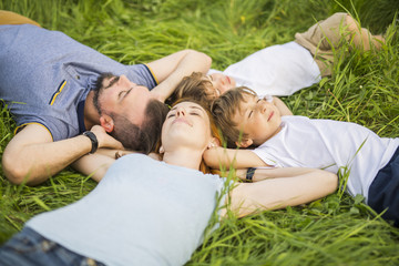Happy family in the meadow