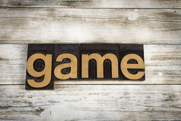 Game Letterpress Word on Wooden Background