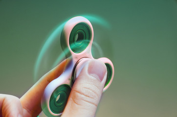 Cool green fidget spinner spin motion 