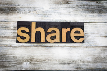 Share Letterpress Word on Wooden Background