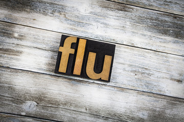 Flu Letterpress Word on Wooden Background