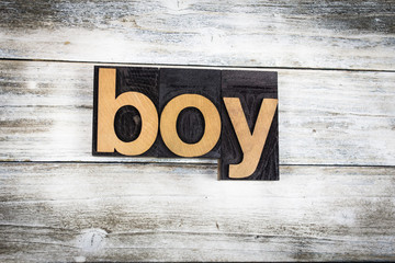 Boy Letterpress Word on Wooden Background