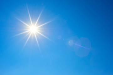 Blue sky with bright sun