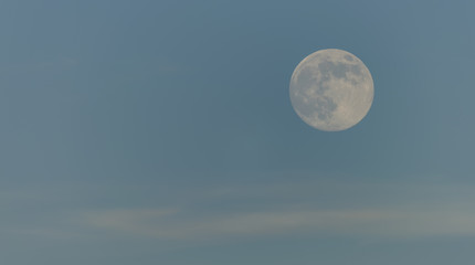 Day moon with light blue sky
