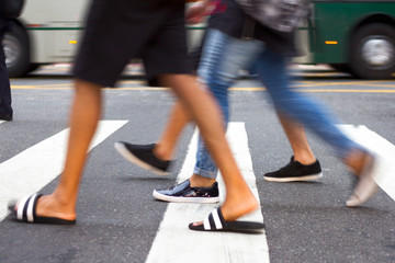 Naklejka premium People crossing the streets