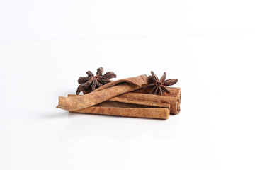 Cinnamon sticks with star anise isolated with white background