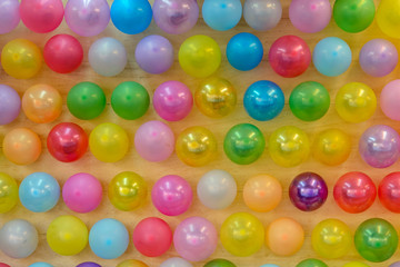 colorful balloons on a wooden wall