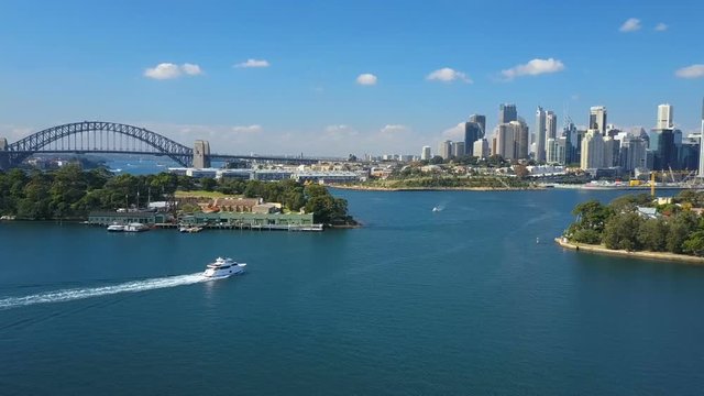 Aerial video of Sydney Harbour, with view of Harbour Bridge, Opera House and skyline of CBD