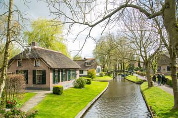 Tourist boat travel and visit Giethoorn village where call Venice of the North in Netherlands.